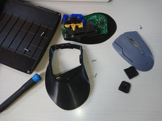 Partially disassembled Ploopy mouse.
