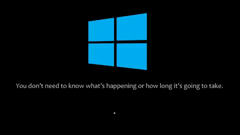 Windows logo on a black screen with text reading, "You don’t need to know what’s happening or how long it’s going to take," conveying frustration.