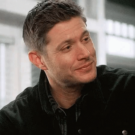 GIF showing a smug smile.