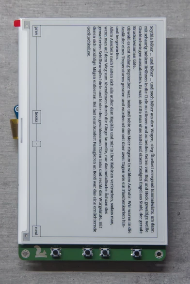 The assembled ZEReader device, with display and PCB. There is no enclosing yet and the text is 90 degrees rotated.