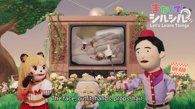Marin, Gojou and his grandfather as… Puppets? For a short explanatory scene? And for some reason Marin’s puppet has kemomimi and Gojou wears a fez. What drugs are those people on, I want some