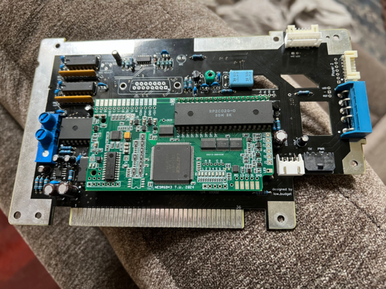 A picture of the NESRGB installed into an NESessity v1.4 mainboard.