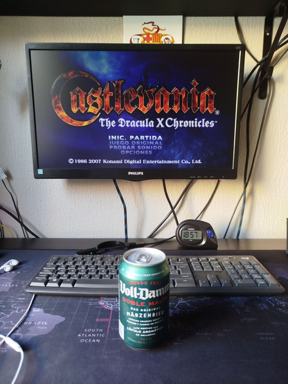 It see a beer and the background the screen is showing the game Castlevania.