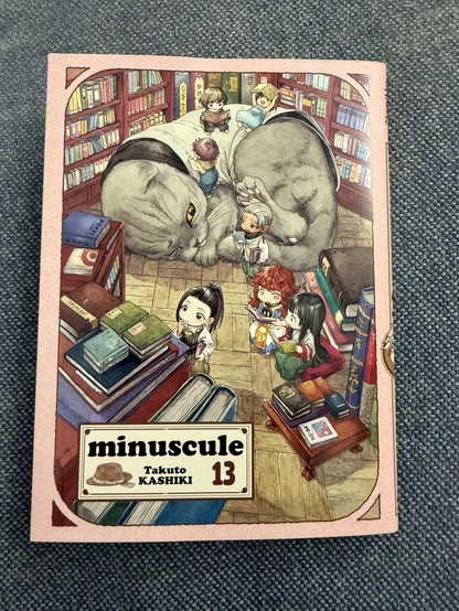 Volume 13 of « Minuscule », AKA « Hakumei & Mikochi ». Little human-like people examining books in a library. Also there’s a cat