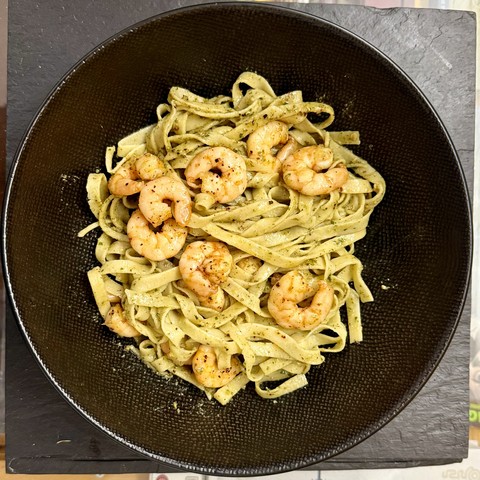 Homemade fettuccine with thaï basil pesto and shrimps sautées with piment d’Espelette