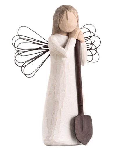 old twee angel with a shovel figure like I see in my grandparents house