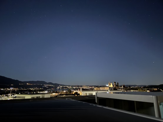 Photo of the skyline of Rapperswil, including the castle, by night. 