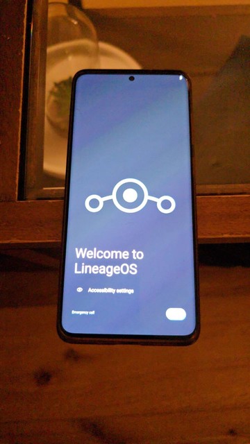 A Samsung Galaxy S20+ just after booting LineageOS for the first time, displaying the LineageOS logo and a "Welcome to LineageOS" message
