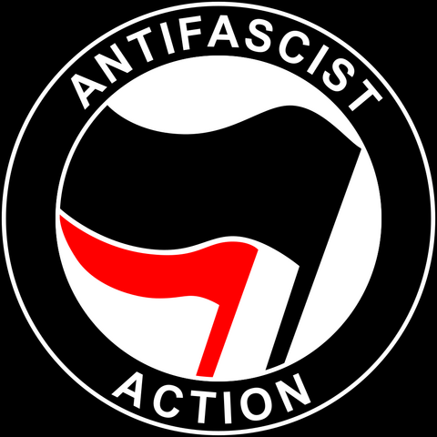 Circular logo with two overlapping flags, one black and one red. The words "Antifascist Action" encircle the flags, set against a black background.