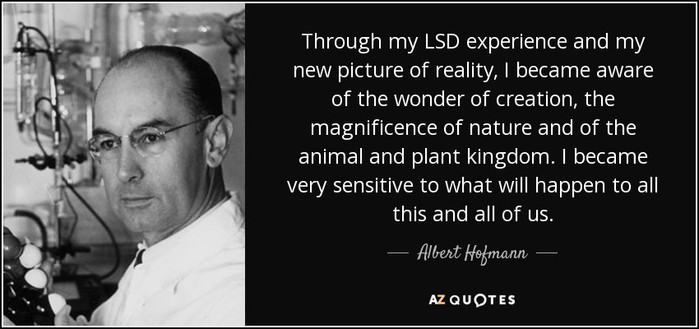 Black and white photo of Albert Hofmann in a lab, holding a molecular model. Beside the photo is a quote: 'Through my LSD experience and my new picture of reality, I became aware of the wonder of creation, the magnificence of nature and of the animal and plant kingdom. I became very sensitive to what will happen to all this and all of us.' Albert Hofmann.