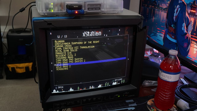 A picture of the JVC TM-H150CG showing the xStation bootscreen running through the new input card in Slot D.