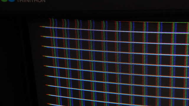 A grid of "white" squares...but the convergence is bad.  You can see the individual R, G, and B colors not lining up in the horizontal plane and are also a bit off in the vertical plane.
