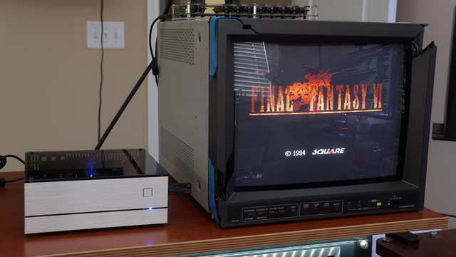The Ironclad MiSTer sitting beside a JVC TM-H150CG CRT monitor with the Final Fantasy 6 start screen being displayed.