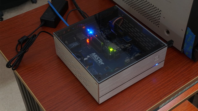 A better picture of the MiSTer Ironclad mATX build sitting in its smol case.