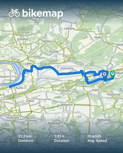 A map displaying a cycling route from Bikemap, featuring a distance of 23.1 km, a duration of 1 hour and 31 minutes, and an average speed of 15 km/h. The route is marked in blue and includes various. 