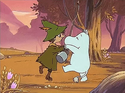 Animated GIF of Moomin and Snufkin joyfully dancing together from the 1990s Moomin series. Moomin, the round white character, and Snufkin, wearing a green hat and coat, move happily in a playful, carefree manner.