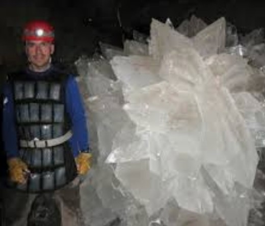low res miner guy standing next to big crystal