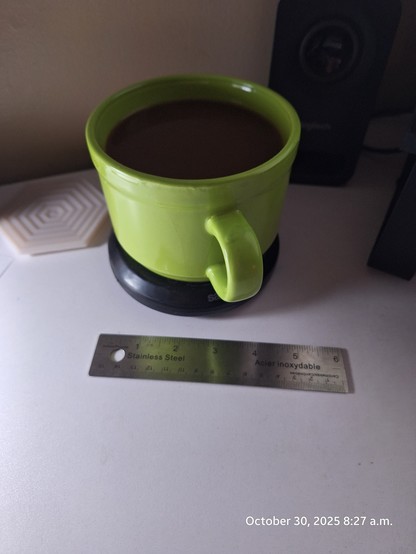 Large mug of fresh coffee with a wee bit of cream.