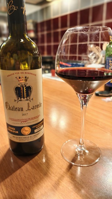 Bottle of chateau Lacoste 2017 red wine