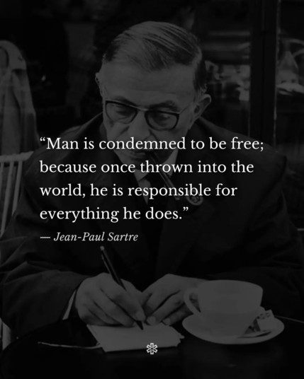 Black-and-white photo of philosopher Jean-Paul Sartre sitting at a café table, wearing glasses and a suit, writing in a notebook with a cup of coffee in front of him. Overlaid text reads: “Man is condemned to be free; because once thrown into the world, he is responsible for everything he does.” — Jean-Paul Sartre.