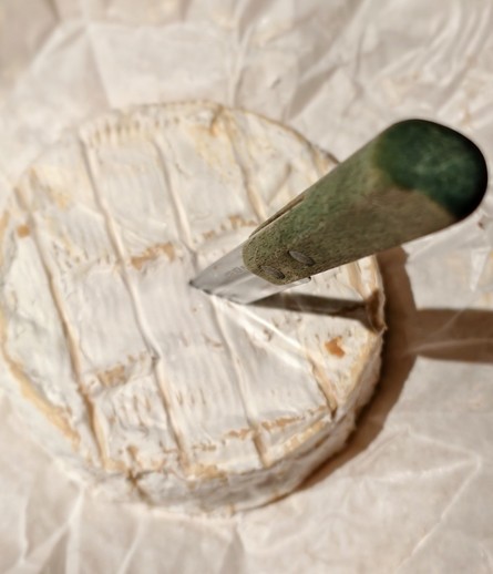 Knife in Camembert. It is what it is.