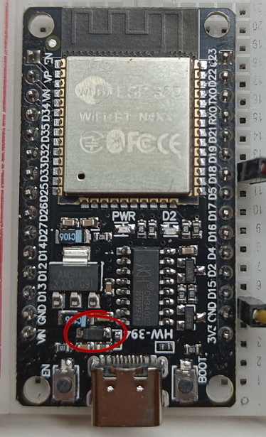 ESP32 with 1N5819W SOF circled.