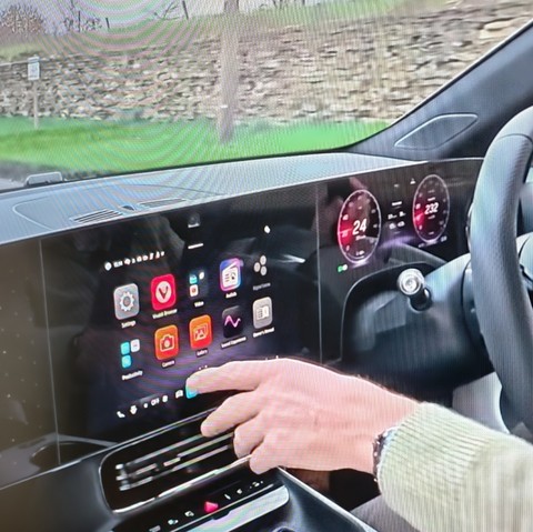 Picture of the dashboard of the latest Mercedes CLA 250+, showing the Vivaldi browser.