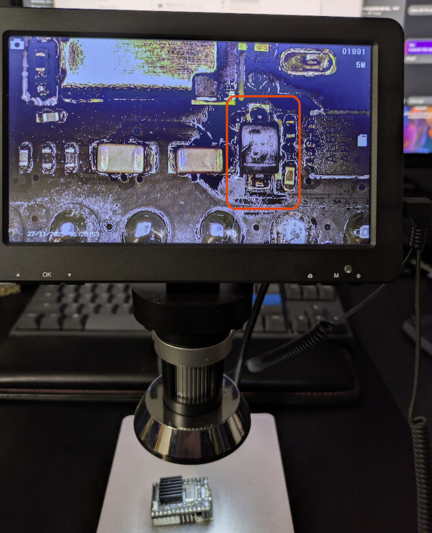 a toasty-looking component shown on a digital microscope screen