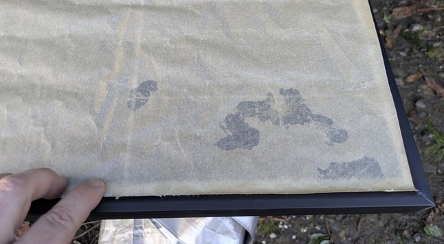 detail of panel showing CA glue under waxed paper