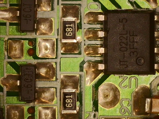 Microscope detail shot of my PCB showing a distinct lack of SPI EEPROM pad