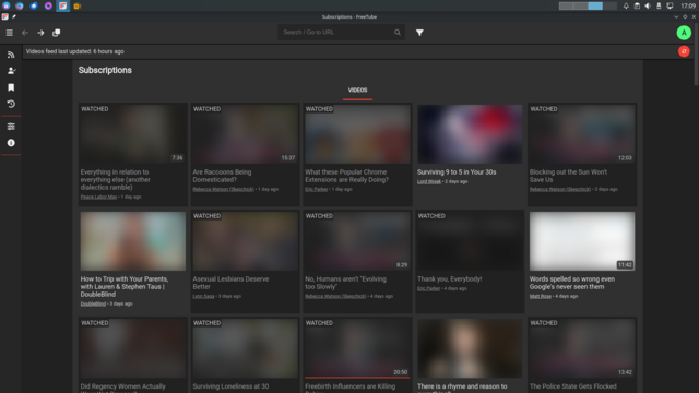 A desktop screenshot of the FreeTube application in dark mode, showing the “Subscriptions” feed. Several video entries are listed vertically, each with a blurred thumbnail, a “WATCHED” label, titles such as “Everything in relation to everything else,” “Are Raccoons Being Domesticated?”, “What these Popular Chrome Extensions are Really Doing?”, and “Surviving 9 to 5 in Your 30s,” along with creator names and upload times. The left sidebar displays icons for feed, subscriptions, history, settings…