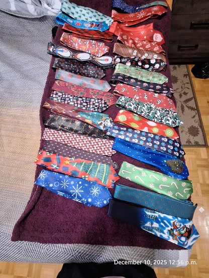 31 unique Christmas themed ties I wear to work.