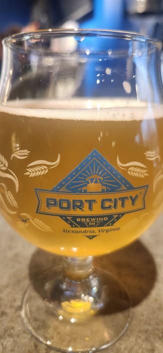 Glass of Port City Optimal Wit