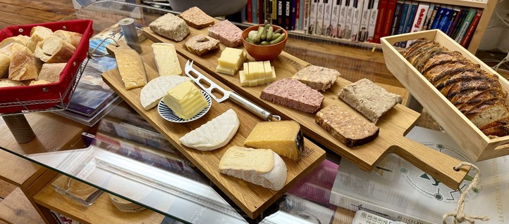 Two big serving boards with some pâté, rillettes, terrine, pickles, cheese...