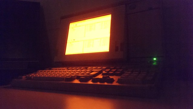 An absolutely pornographic shot of my IBM P70 portable, photographed in the dark, the keyboard bathed in the glow of the gas plasma screen