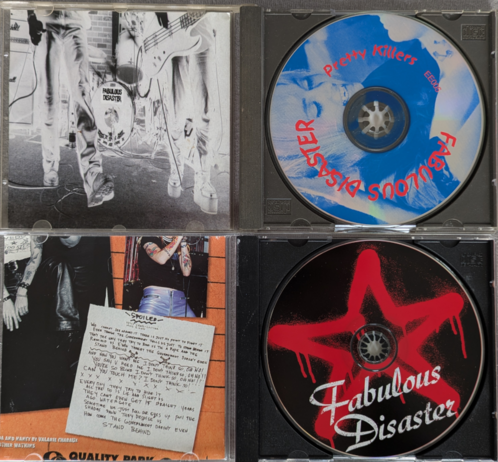 Opened CD cases of "Pretty Killers" and "Put Out Or Get Out"