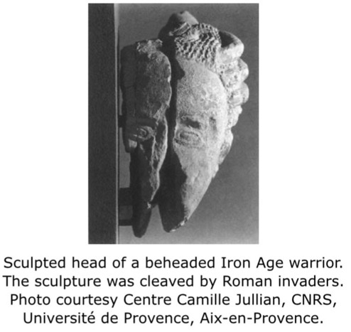 Sculpted head of a beheaded Iron Age warrior. The sculpture was cleaved by Roman invaders. Photo courtesy Centre Camille Jullian, CNRS, Université de Provence, Aix-en-Provence.