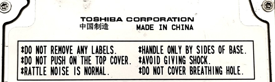 TOSHIBA CORPORATION
MADE IN CHINA

DO NOT REMOVE ANY LABELS
DO NOT PUSH ON THE TOP COVER
RATTLE NOISE IS NORMAL
HANDLE ONLY BY SIDES OF BASE
AVOID GIVING SHOCK
DO NOT COVER BREATHING HOLE