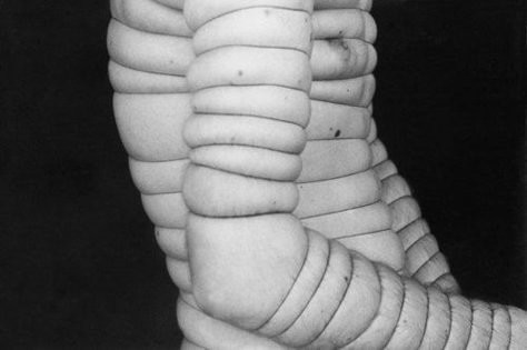 sculpture with bubbly inflated round looking marble arms