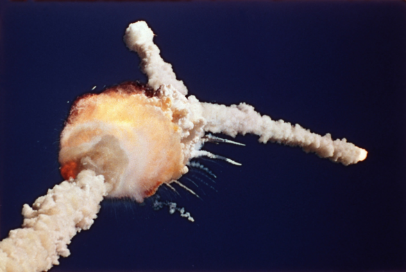 The famous pic of the Challenger explosion, the rocket boosters forming a V at the top of the pic as they veer away from the expanding cloud that used to be the space shuttle.