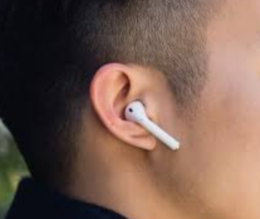 A consoomer wearing an AirPod
