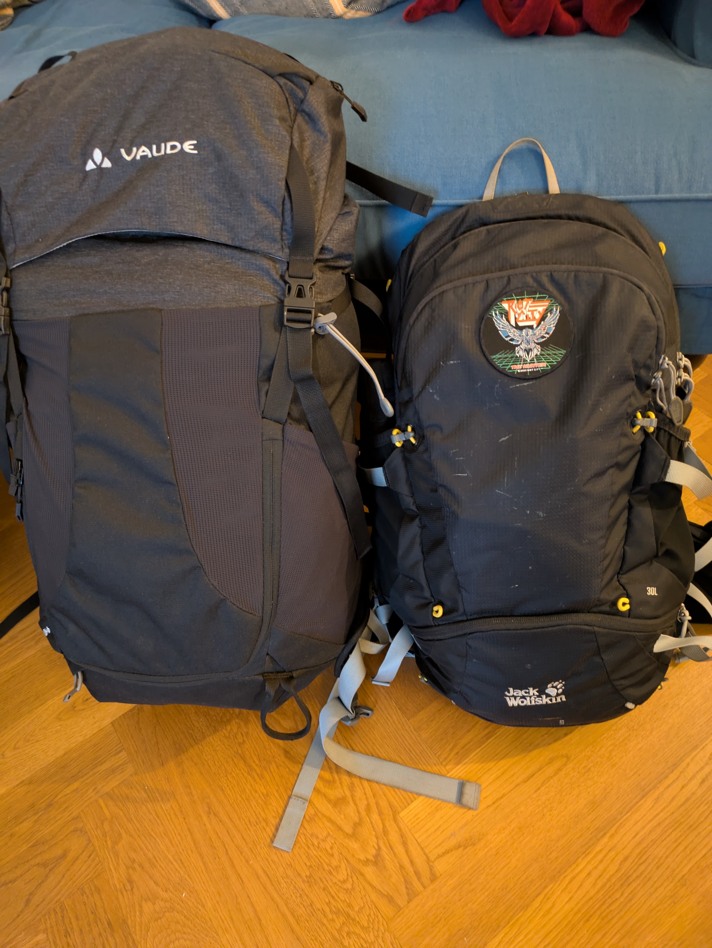 Photograph of two packed backpacks (36L + 6L & 30L)