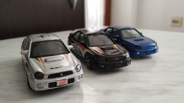 1:43 scale Bburago Subaru Impreza in three flavors