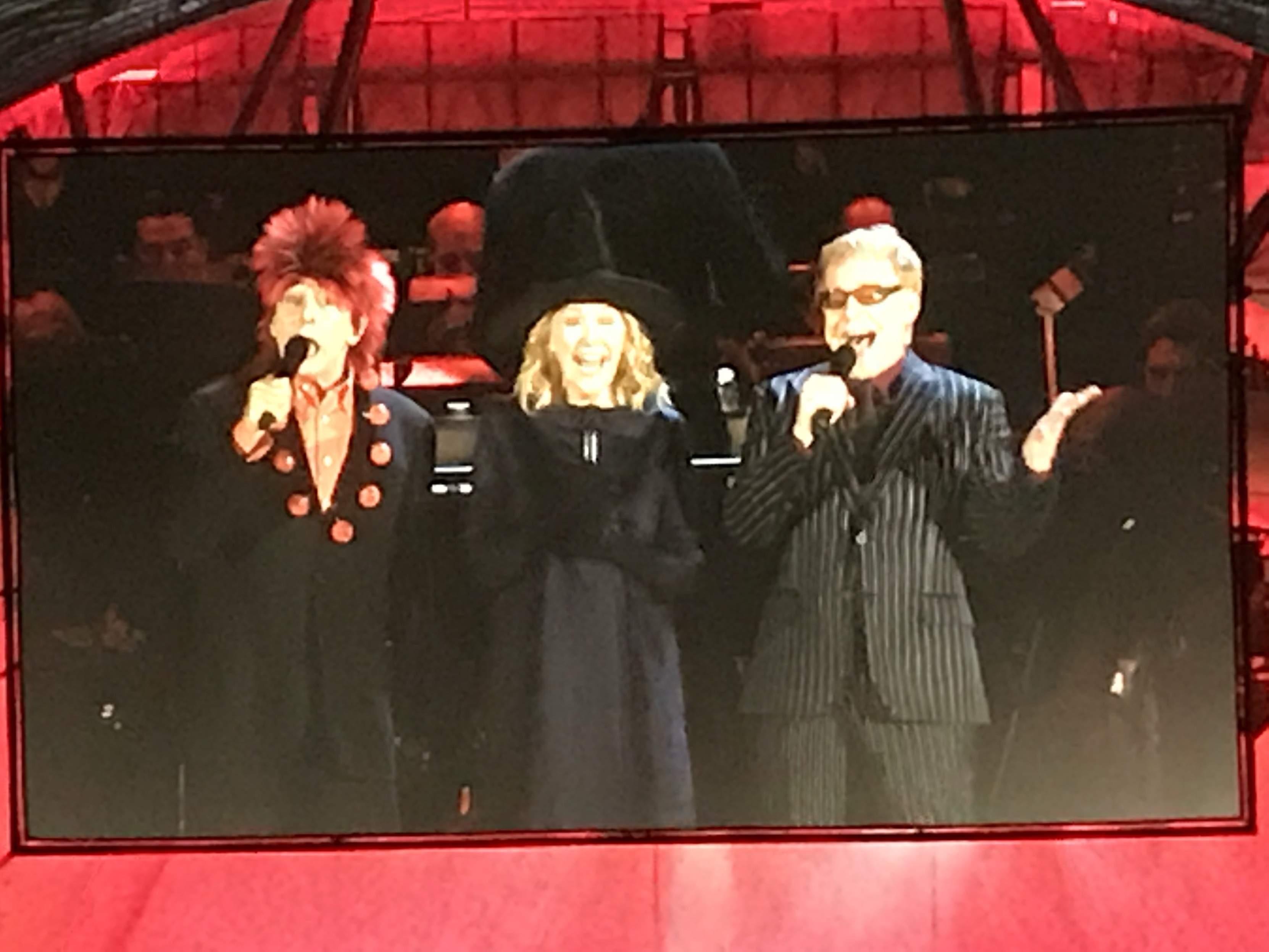 Catherine O’Hara, Paul reubens, Danny Elfman performing at a live event of the nightmare before Christmas at the Hollywood bowl