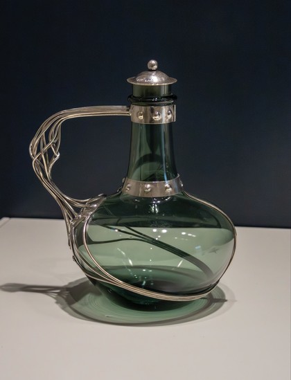 Antique Edwardian English Glass Decanter, 1901. Charles Robert Ashbee (English, 1863-1942). Silver, glass; 20.3 x 16.8 cm

the best potion bottle in the world