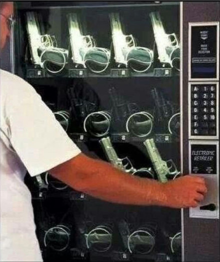 guy gets gun from vending machine's racks of pistols
