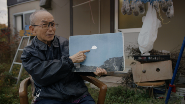 Stories of alien sightings and landings of mysterious aircraft have emerged from Iino as far back as the 1970s. Tsugio Kinoshita, a researcher of unidentified flying objects, said he first saw such an UFO in 1972 at the age of 25.

Kinoshita was hiking a mountain in Fukushima prefecture with four friends when suddenly a saucer-like shape appeared in front of them. “This thing stuck out in front of me. Starting and stopping in the blue sky. Then all of a sudden, it was gone,” he told VICE World …