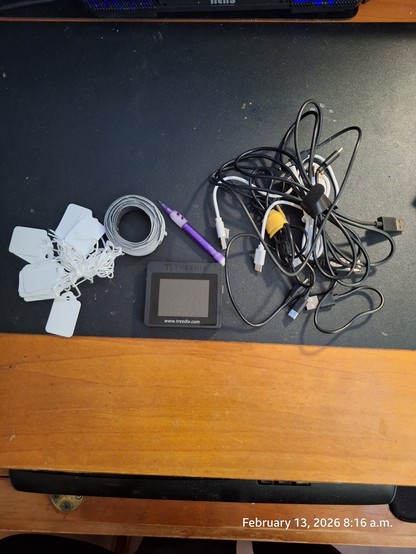 Labels, Velcro ties, USB testers and the USB cables that will be recycled.