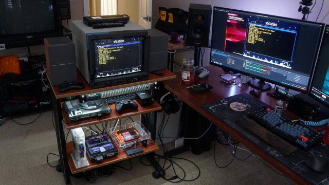 The final form of the printer cart: the JVC PVM with speakers, a RetroTINK 4K, an SNES, NES, Genesis, and PS1 along with a MiSTer and some nice LED lighting.