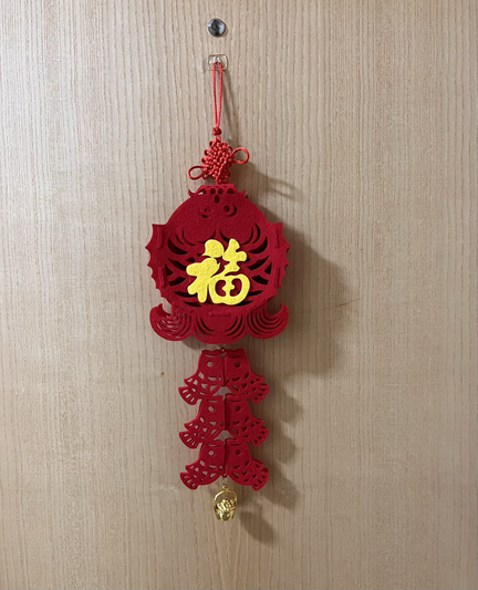 Chinese New Year hanging greeting on door